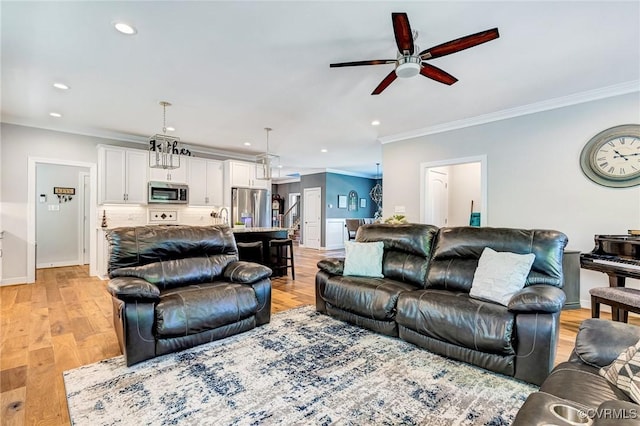 9401 Alsace Ct, Mechanicsville, VA 23116 - living area with a ceiling fan, crown molding, recessed lighting, and light wood-style flooring