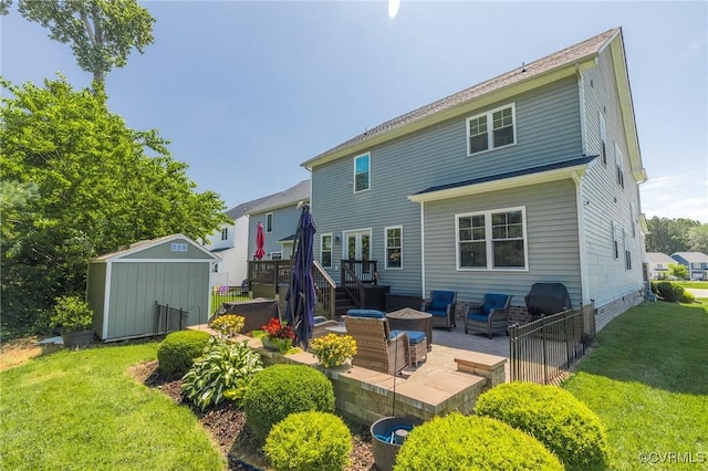 9401 Alsace Ct, Mechanicsville, VA 23116 - back of house featuring a storage unit, a patio area, a yard, a wooden deck, and an outdoor living space
