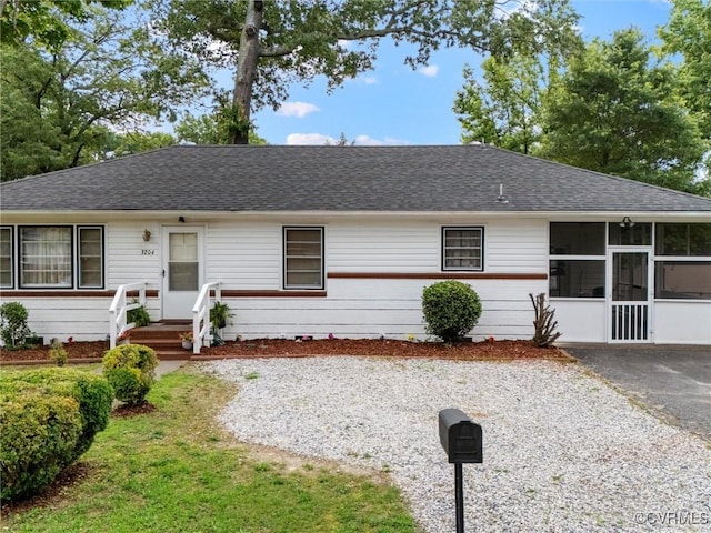 3204 Evergreen Ave, Hopewell, VA 23860 - single story home featuring a shingled roof and a sunroom
