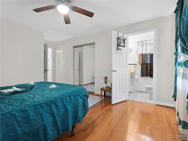 3204 Evergreen Ave, Hopewell, VA 23860 - bedroom with light wood-type flooring, a closet, ceiling fan, and connected bathroom