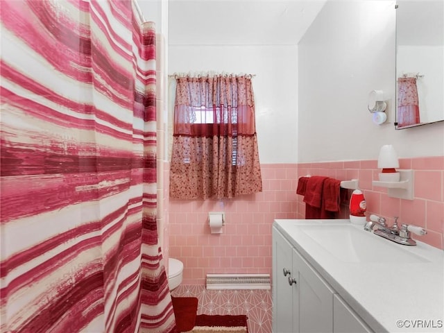 3204 Evergreen Ave, Hopewell, VA 23860 - full bathroom featuring tile walls, vanity, wainscoting, and a shower with curtain