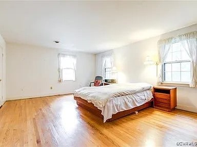 1600 Donora Ct, Henrico, VA 23229 - bedroom with multiple windows and light wood finished floors