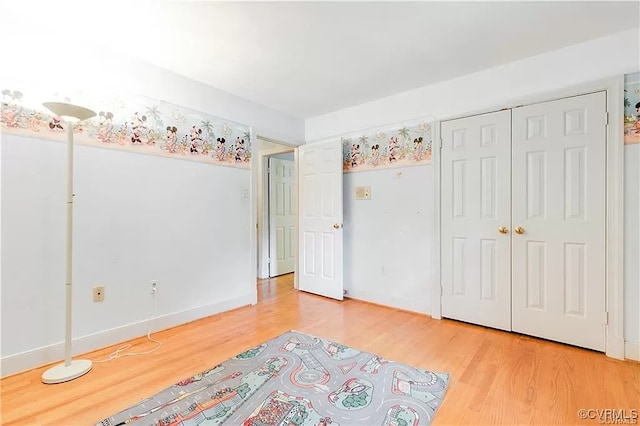 1600 Donora Ct, Henrico, VA 23229 - unfurnished bedroom with light wood finished floors and a closet