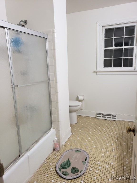 1600 Donora Ct, Henrico, VA 23229 - bathroom with tile patterned flooring and shower / bath combination with glass door