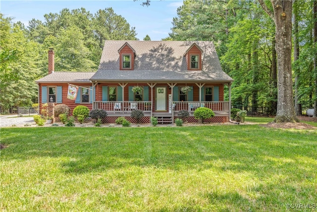 15615 Providence Rd, Prince George, VA 23805 - view of front of house featuring covered porch, a front lawn, and a chimney
