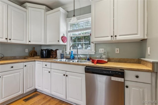 3608 Shell Rd, Newport News, VA 23661 - kitchen featuring stainless steel dishwasher, white cabinets, hanging light fixtures, light wood-type flooring, and light countertops