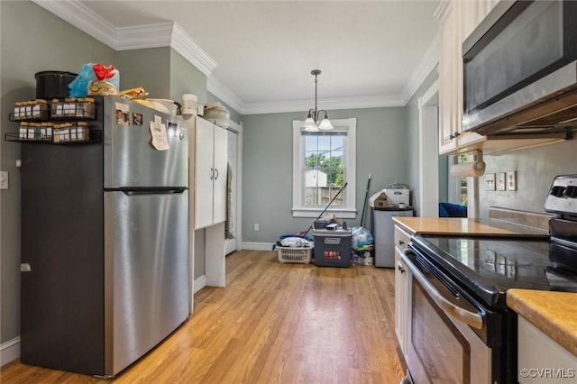 3608 Shell Rd, Newport News, VA 23661 - kitchen with appliances with stainless steel finishes, light wood finished floors, a chandelier, ornamental molding, and decorative light fixtures