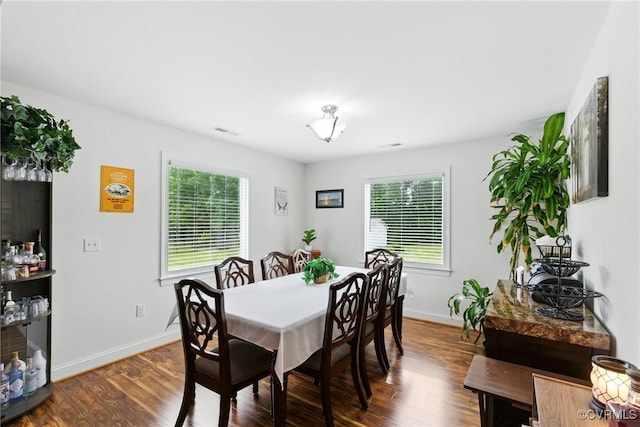 112 Rosemary Ct, Tappahannock, VA 22560 - dining room with healthy amount of natural light and dark wood-style flooring