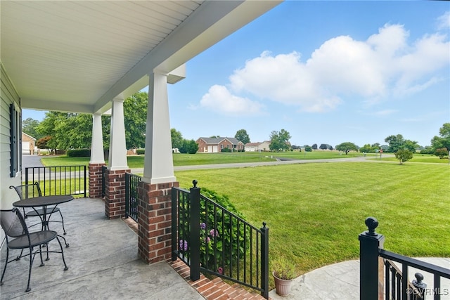112 Rosemary Ct, Tappahannock, VA 22560 - covered porch featuring a yard
