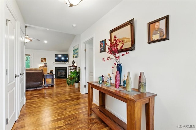 112 Rosemary Ct, Tappahannock, VA 22560 - corridor featuring wood finished floors and vaulted ceiling