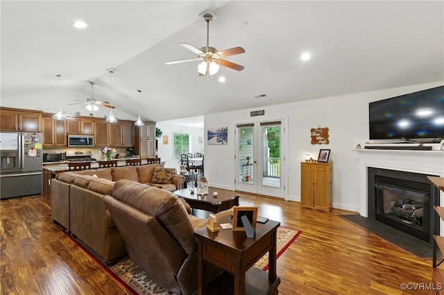 112 Rosemary Ct, Tappahannock, VA 22560 - living area featuring a ceiling fan, dark wood-type flooring, a fireplace with flush hearth, recessed lighting, and high vaulted ceiling