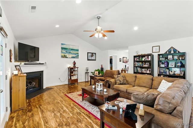 112 Rosemary Ct, Tappahannock, VA 22560 - living area with a ceiling fan, lofted ceiling, wood finished floors, and a fireplace with flush hearth