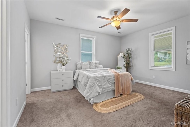 1808 N 20th St, Richmond, VA 23223 - carpeted bedroom with baseboards and a ceiling fan