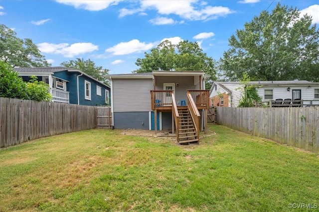 1808 N 20th St, Richmond, VA 23223 - back of property featuring stairway, a deck, and a fenced backyard
