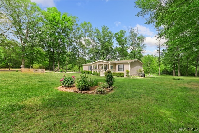 14231 Dykeland Rd, Amelia Courthouse, VA 23002 - view of front of property with a front yard and view of wooded area