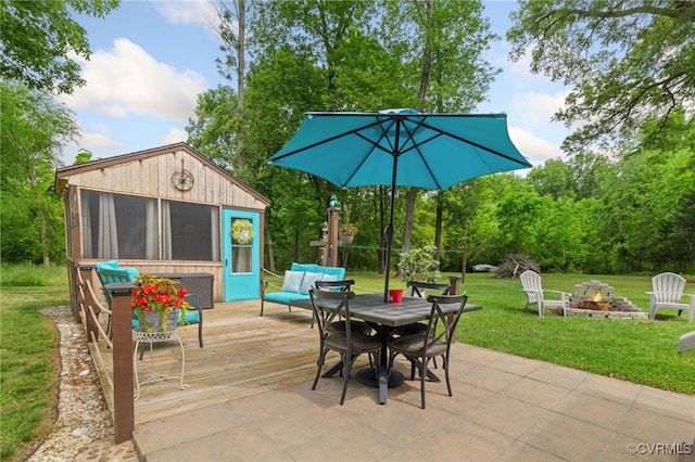 14231 Dykeland Rd, Amelia Courthouse, VA 23002 - view of patio featuring a deck, a fire pit, a sunroom, and outdoor dining area