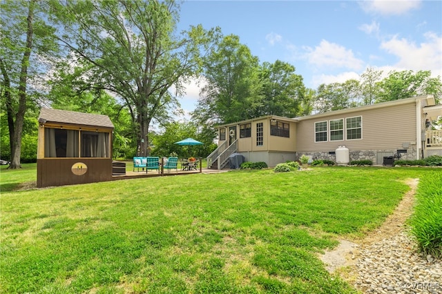 14231 Dykeland Rd, Amelia Courthouse, VA 23002 - view of grassy yard featuring a sunroom