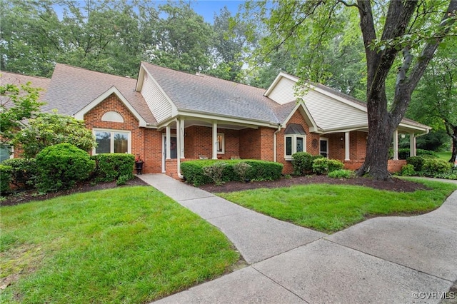 3110 Lake Shire Ct Unit 3110, Richmond, VA 23235 - ranch-style home with a porch, brick siding, and a front lawn