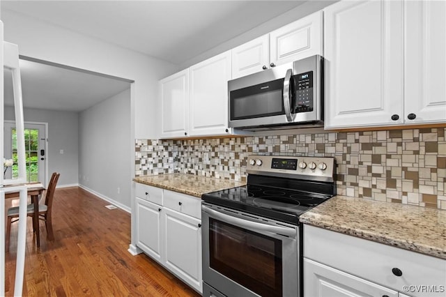 3110 Lake Shire Ct Unit 3110, Richmond, VA 23235 - kitchen featuring stainless steel appliances, tasteful backsplash, and white cabinets