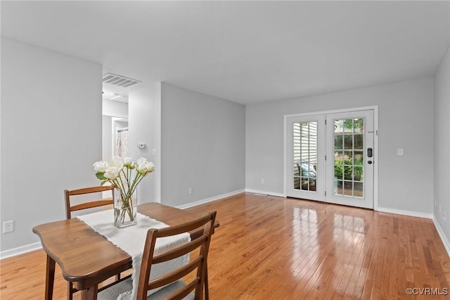 3110 Lake Shire Ct Unit 3110, Richmond, VA 23235 - dining room with light wood-style flooring and baseboards