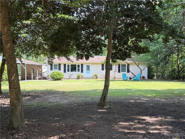 616 Long Point Ln, Topping, VA 23169 - back of property with a lawn
