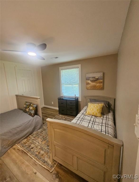 616 Long Point Ln, Topping, VA 23169 - bedroom featuring wood finished floors and a ceiling fan