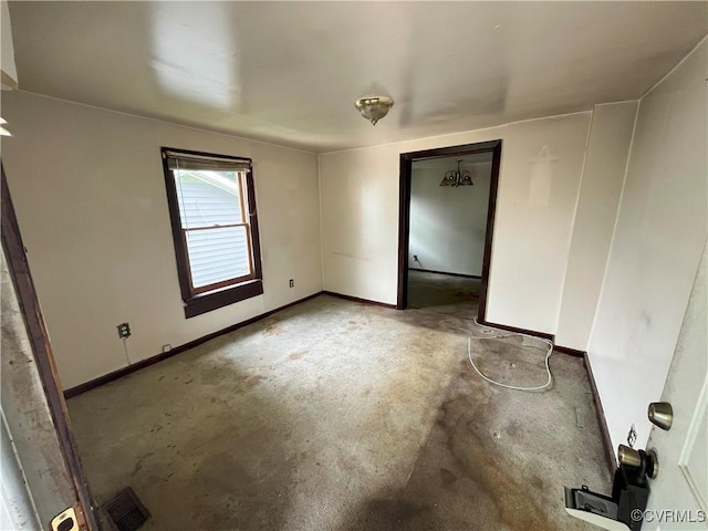 511 Hannon St, Petersburg, VA 23803 - spare room featuring concrete flooring and baseboards
