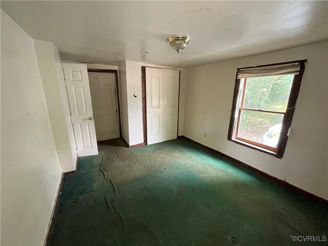 511 Hannon St, Petersburg, VA 23803 - unfurnished bedroom with carpet and a closet
