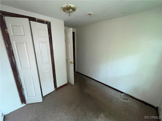 511 Hannon St, Petersburg, VA 23803 - unfurnished bedroom with carpet floors and a closet