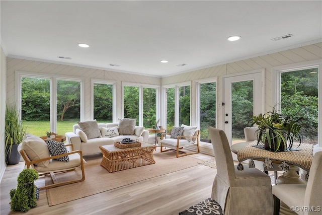 7709 Yolanda Rd, Henrico, VA 23229 - sunroom / solarium with ornamental molding, plenty of natural light, wood finished floors, and recessed lighting