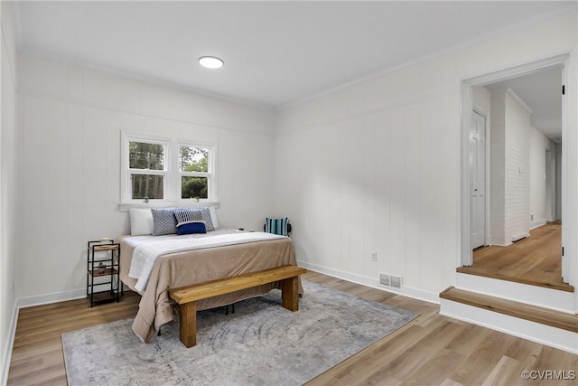 7709 Yolanda Rd, Henrico, VA 23229 - bedroom featuring wood finished floors and crown molding