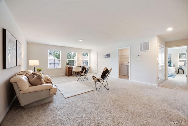 15037 Hazelbury Cir, Midlothian, VA 23112 - carpeted living room with washer / dryer and recessed lighting