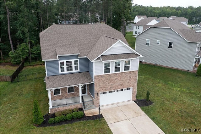 15037 Hazelbury Cir, Midlothian, VA 23112 - traditional-style home featuring stone siding, a garage, a porch, driveway, and roof with shingles