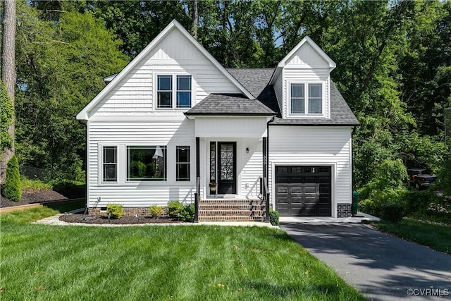 509 Danray Dr, Henrico, VA 23227 - view of front facade featuring a front yard, driveway, and roof with shingles