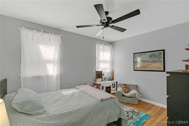 7284 Farinholt St, Gloucester, VA 23061 - bedroom featuring wood finished floors and a ceiling fan