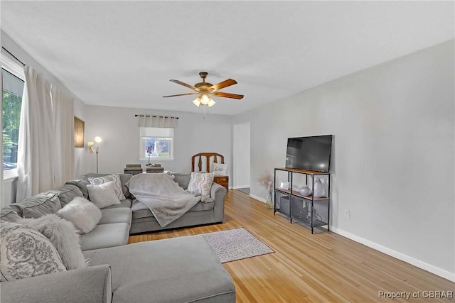 7284 Farinholt St, Gloucester, VA 23061 - living room featuring plenty of natural light, light wood-style floors, and ceiling fan