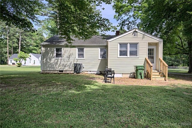 7284 Farinholt St, Gloucester, VA 23061 - back of house featuring crawl space, a lawn, and entry steps