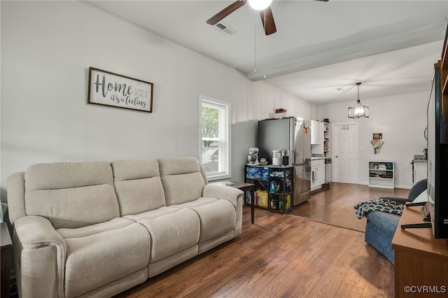 3315 Romancoke Ave, West Point, VA 23181 - living room featuring a ceiling fan and dark wood-type flooring