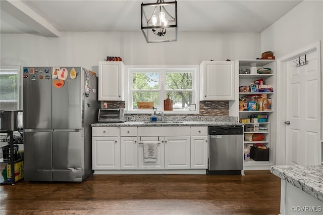 3315 Romancoke Ave, West Point, VA 23181 - kitchen featuring stainless steel appliances, backsplash, and white cabinets