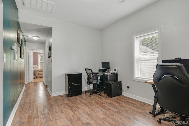 3315 Romancoke Ave, West Point, VA 23181 - home office featuring wood finished floors and baseboards