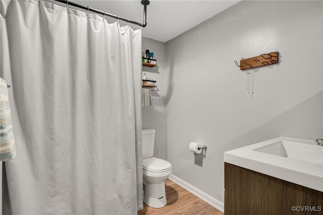 3315 Romancoke Ave, West Point, VA 23181 - bathroom with wood finished floors, vanity, and curtained shower