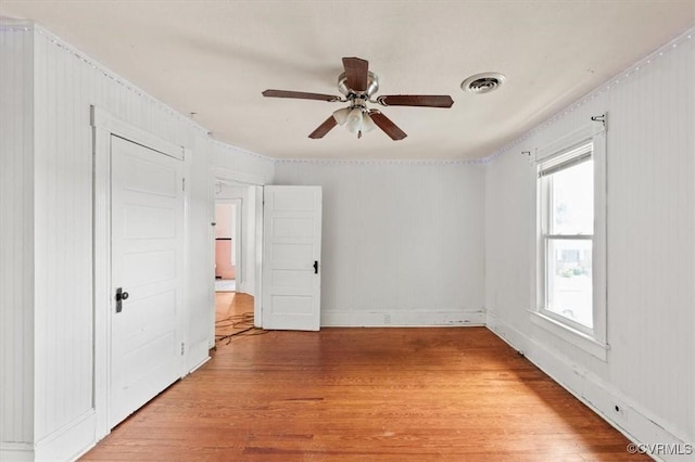 224 Hamilton Ave, Colonial Heights, VA 23834 - unfurnished bedroom featuring light wood-style flooring and a ceiling fan
