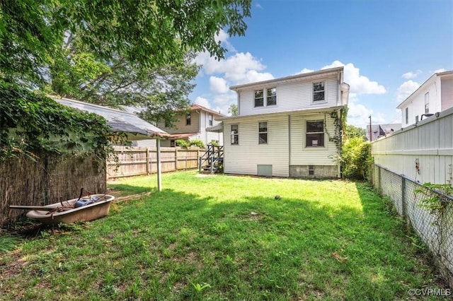 224 Hamilton Ave, Colonial Heights, VA 23834 - rear view of house with a fenced backyard