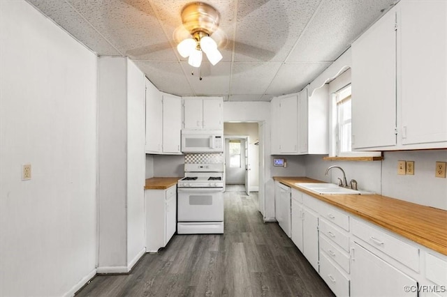 224 Hamilton Ave, Colonial Heights, VA 23834 - kitchen featuring white appliances, a paneled ceiling, ceiling fan, dark wood-style flooring, and white cabinets