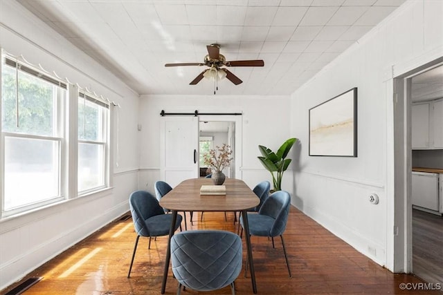 224 Hamilton Ave, Colonial Heights, VA 23834 - dining room featuring a barn door, wood finished floors, and ceiling fan