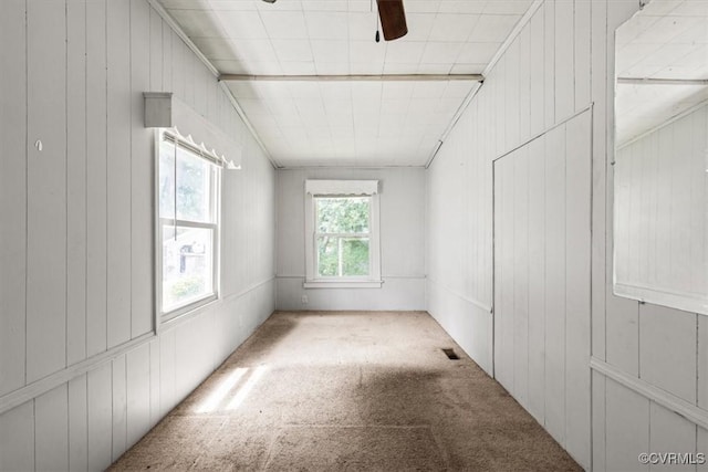 224 Hamilton Ave, Colonial Heights, VA 23834 - empty room featuring carpet floors, wood walls, and ceiling fan