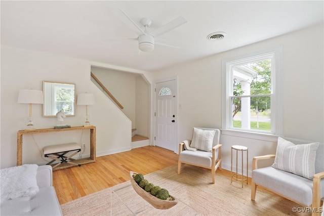 8467 Shady Grove Rd, Mechanicsville, VA 23116 - foyer entrance featuring stairs, wood finished floors, and a ceiling fan