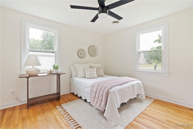 8467 Shady Grove Rd, Mechanicsville, VA 23116 - bedroom with wood finished floors and ceiling fan