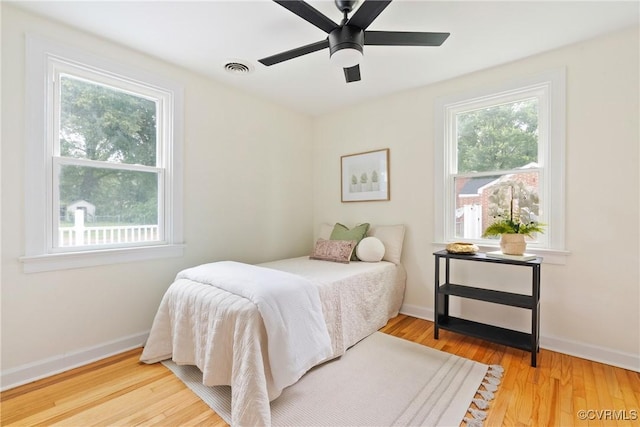 8467 Shady Grove Rd, Mechanicsville, VA 23116 - bedroom with wood finished floors and ceiling fan