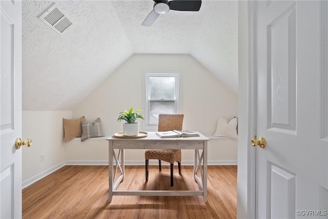 8467 Shady Grove Rd, Mechanicsville, VA 23116 - office area with wood finished floors, a textured ceiling, vaulted ceiling, and a ceiling fan
